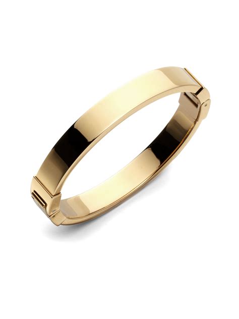 michael kors gold hinged bangle|Michael Kors adjustable bracelet.